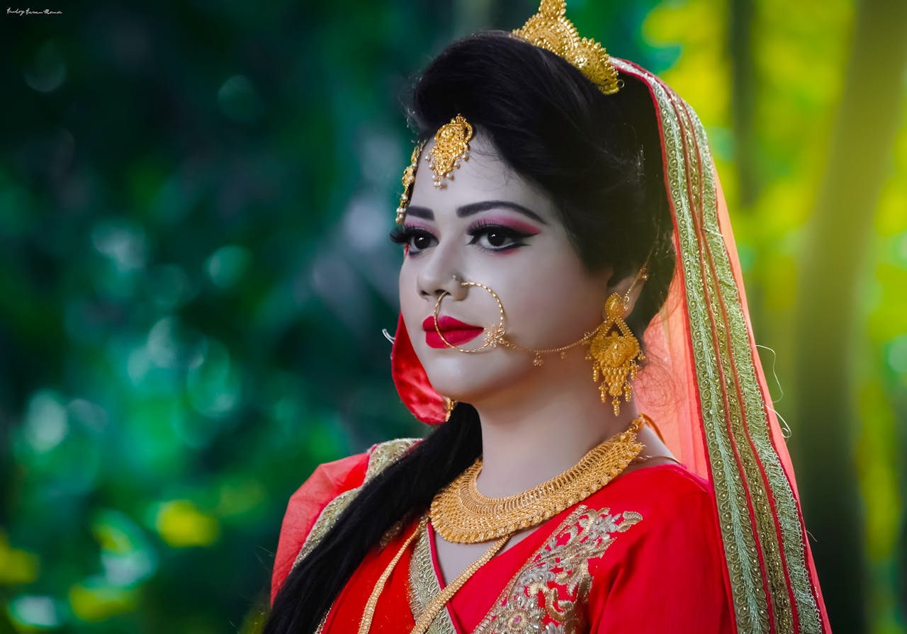 Crafting Captivating Headlines: Your awesome post title goes here Elegant portrait of a woman wearing traditional bridal attire, featuring vibrant colors and exquisite jewelry.